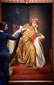 ALEX KAVANAGH, EXHIBITION OFFICER, POLISHES A PAINTING OF KING JOHN. PART OF THE BRITISH LIBRARY'S MAGNA CARTA: LAW, LIBERTY,LECACY EXHIBITION OPENING ON MARCH 13TH. PHOTO BY CLARE KENDALL. FOR FURTHER INFO CONTACT PRESS OFFICE 02074127110